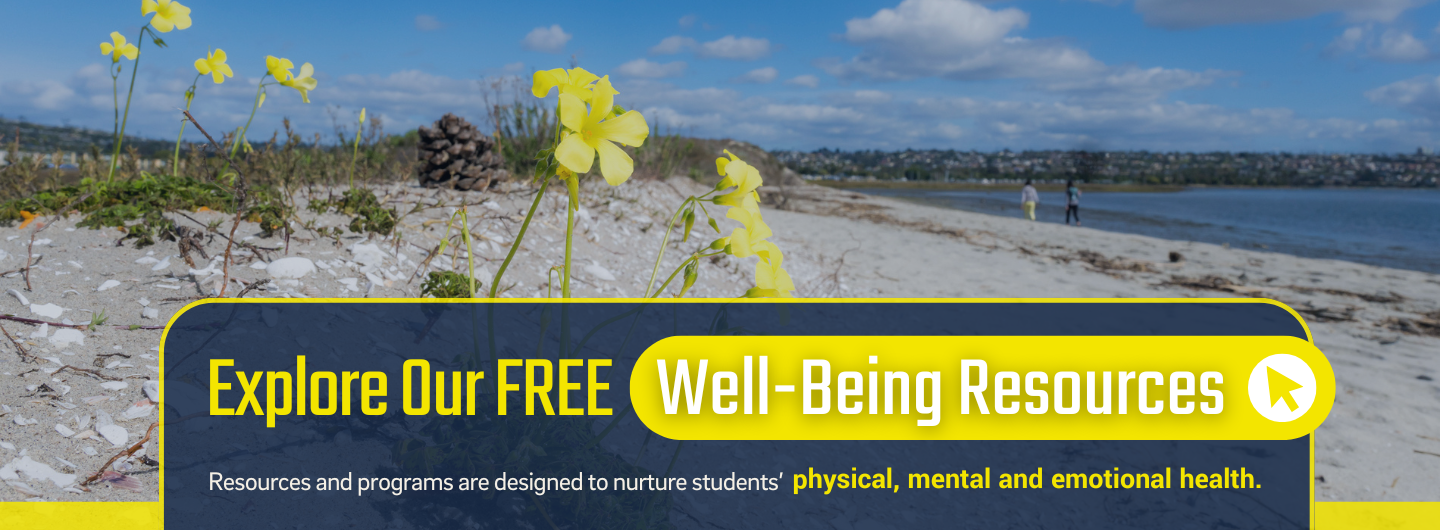 A beach scene with yellow flowers.